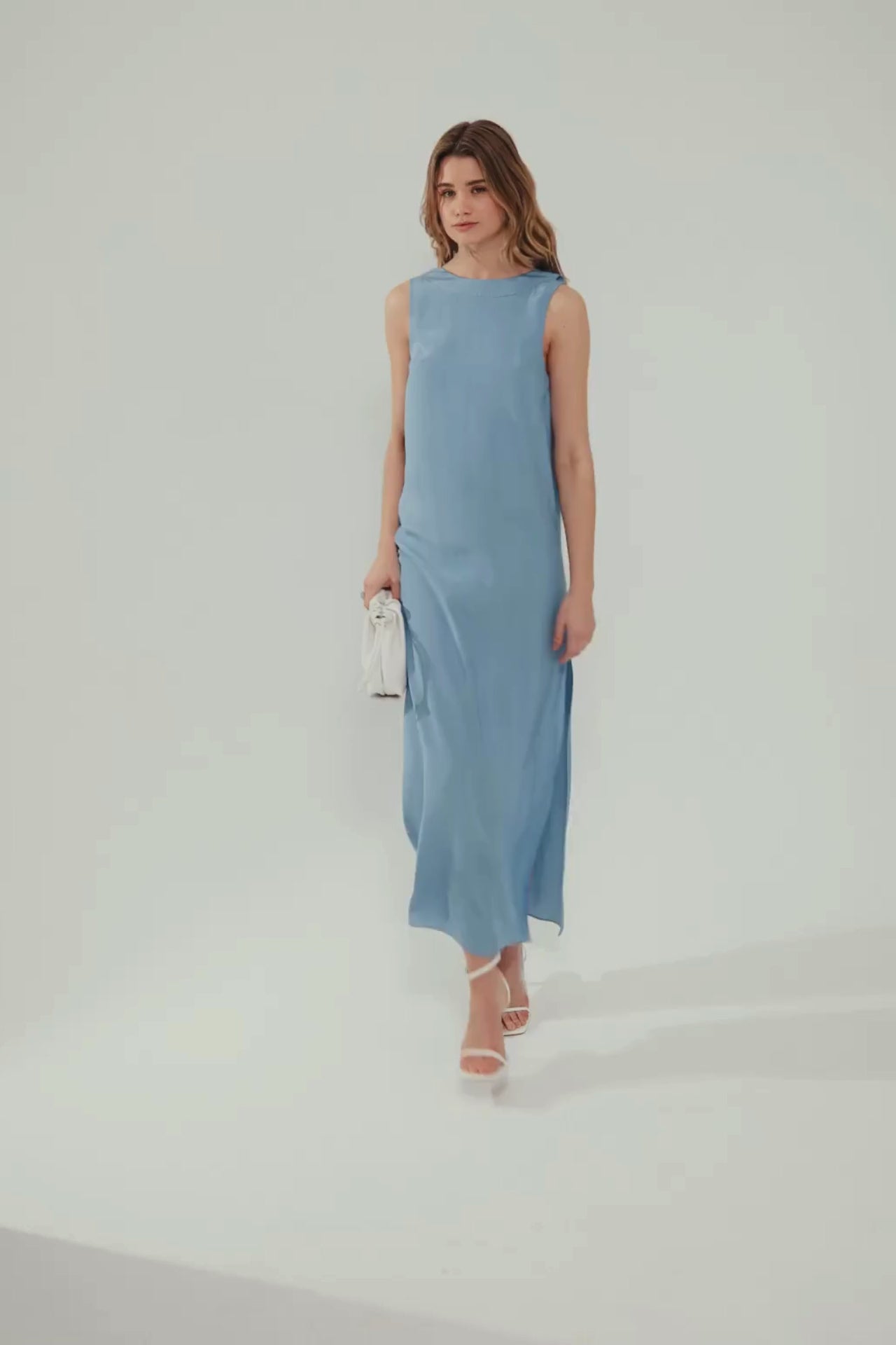 E-commerce video with a model waling in blue dress