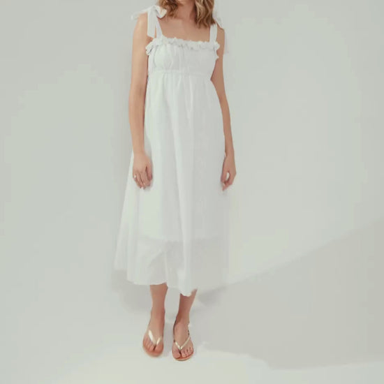 E-commerce video with a model waling in maxi white dress